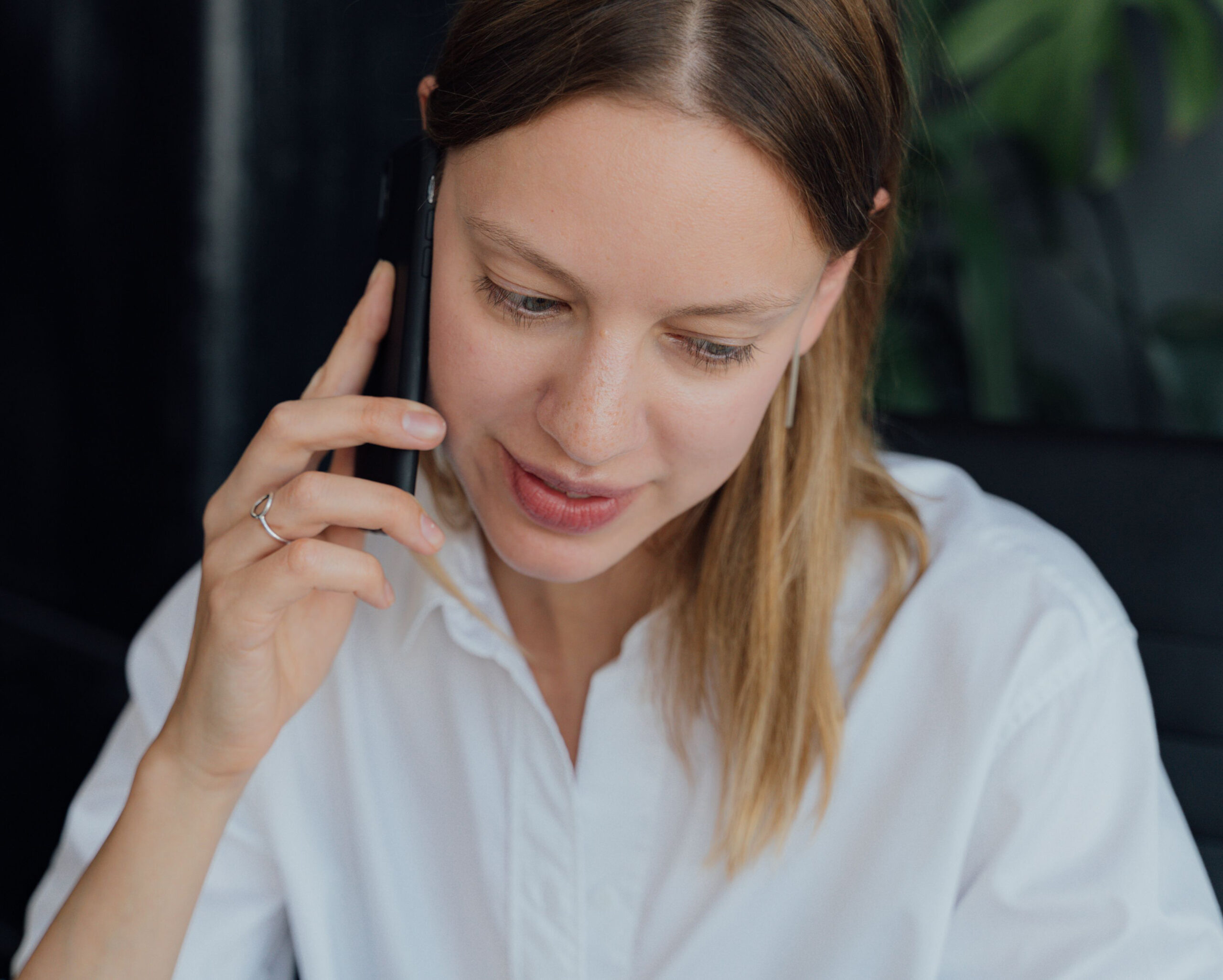 a woman using a smart phone